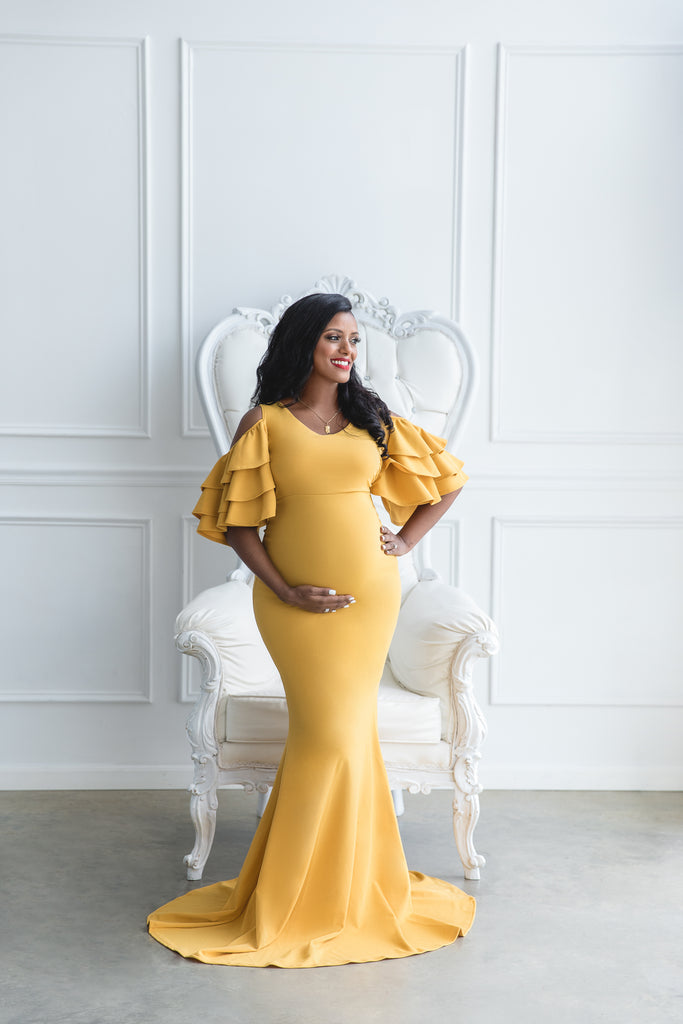 Bright yellow maternity dress top